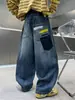 Nueva colección de otoño de pantalones vaqueros para niños, pantalones vaqueros largos modernos y versátiles para niños y estudiantes de secundaria.