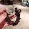 Tocado de cuerda para el cabello de alta gama con forma de anillo para mujer, estilo coreano, elegante, con perlas y bolas de goma para el cabello de celebridades de Internet.