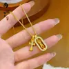Tienda de oro con collar de oro antiguo mortero valiente colgante de diamante cruz cadena para clavícula femenina plegada venta al por mayor