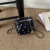 Bolso pequeño de cadena de rombos para mujer 2026 otoño nuevo estilo individual elegante temperamento ins moderno de un solo hombro bandolera bolso cuadrado pequeño