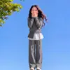 Conjunto de Roupa para Meninas Primavera e Outono 2026 Novo Suéter Cardigan Infantil Estiloso com Barra de Renda e Calça Wide-Leg Conjunto de Duas Peças Tendência