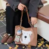Bolsa Feminina 2025 Nova Moda Retrô Estilo Estrangeiro Design de Nicho Grande Capacidade Ombro Único Transversal Tote Bolsa Grande Tendência