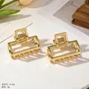 Pinza para el pelo de metal de venta caliente europea y americana para mujer, sensación de alta gama, decoración de lazo y mariposa, pinza de garra, accesorio pequeño para el pelo versátil de lujo ligero y temperamento