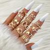 Joyas Transfronterizas Anillos Huecos en Tono Dorado para Mujer, Set Geométrico Simple de Múltiples Piezas para Apilar, Accesorios de Mano de Nicho