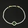 Nuevo Pulsera de Broche de Cuatro Hojas Redondo Completamente Diamantado Micro Pavé de Circonita Cadena de Tenis Diseño de Nicho