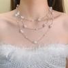 Estilo francês Light Luxury Super Long Pearl Chain Niche High-end Retro Baroque Clavícula Cadeia com vários métodos de uso