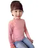 Camiseta de manga larga de color liso con encaje para niña, nueva y moderna, para primavera y otoño, fina, en liquidación, de algodón para otoño e invierno.
