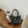 Bolso modelo nuevo 2026 transfronterizo, bolso de mano simple estilo coreano, bolso tipo cubo de moda de gran capacidad, bolso cruzado casual para el día a día