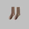 Calcetines de invierno de rizo para hombre con forro polar, engrosados, de color liso, hasta la pantorrilla, a prueba de frío, anticongelantes, calcetines para hombre, calcetines de rizo de otoño e invierno de Zhuji