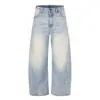 Jeans de hombre con lavado degradado estilo americano y dobladillo curvo, vibra de moda urbana, silueta punk desgastada, pantalones largos holgados de pierna ancha