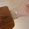 Rama Completa de MariposaPulsera Hueca de Mariposa Estilo Chino Nuevo para Mujer, Pulsera Elegante de Esmalte Rosa y Plateado Estilo Nacional Vintage