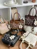 Bolsa feminina transfronteiriça 2026 nova moda versátil brilhante bordado pesado bolsa de mão Lady Dior bolsa de ombro transversal com fita
