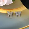 Material diy hecho a mano accesorios de aleación de pedrería mariposa flor conejo oso hebilla flor de zapato colgante de bolsa