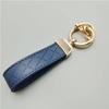 Chaveiro de carro de moda boutique atacado de fábrica microfibra personalidade diamante em relevo chaveiro pingente de couro