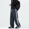 Novas calças casuais de outono e inverno para homens, com forro de fleece, tecido de algodão espesso, design de perna reta, modelagem solta e um estilo esportivo moderno