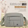 Casual Urbano 2025 Outono Nova Bolsa Feminina Versátil Casual Ombro Transversal Múltiplos Bolsos Bolsa de Pano para Mamãe Atacado