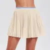 La falda de tenis Caijue para mujer es transpirable y anti-exposición, una falda de malla versátil de dos piezas adecuada para correr al aire libre y deportes, con un diseño plisado