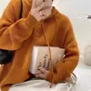 Suéter de Tricô com Capuz Feminino Outono e Inverno 2024 Novo Estilo Japonês Retrô Estilo Preguiçoso Peça Externa Solta Suéter de Tricô de Celebridade da Internet