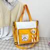 Bolsa Tote de Mano para Estudiante con Muñeco de Oso de Dibujos Animados Estilo Coreano Estilo Académico Moderna Bolsa de Juguete de Colores Bolso de Hombro
