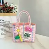 Nova bolsa de piquenique de primavera, bolsa de palha grande, esquema de cores rosa fofo, design xadrez color-block fresco e estiloso