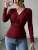 Nueva moda femenina transfronteriza europea y americana, camiseta de manga larga estilo francés con cuello en V cruzado, cintura fruncida ceñida, ajuste ceñido y adelgazante, top de otoño-invierno