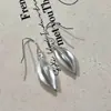 Nuevos Pendientes de Madera Cepillada Minimalistas y Compactos para Mujer, Diseño de Carambola de Nicho, Estilo Lujo Ligero, Pendientes de Moda, Venta al por Mayor para Transmisiones en Vivo