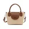 Bolso Vintage Popular de Moda para Mujer 2026 Primavera/Verano Nuevo Bolso Cruzado Casual con Solapa Estilo Coreano Bolso de Mano Bolso Cubo