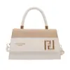 Bolso pequeño cuadrado de mano texturizado, colección primavera 2026, bolso de hombro de lujo ligero de alta gama, bolso cruzado versátil casual para el día a día de nicho