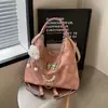 Bolso grande de mujer popular transfronterizo, moderno y de alta gama, con detalle de lazo, mochila de un solo hombro y de doble hombro, bolso de axila de diseño nicho