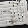 Explosiones en Vivo Estilo Étnico Corre en el Tiempo Cadena de Lana de Flor Collar Largo Plata de Xizang Candado de Larga Vida Colgante de la Riqueza del Cuarteto