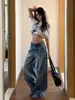 Jeans retro americanos lavados de cintura alta con corte curvo para mujer, nuevo diseño de primavera y otoño, pantalones anchos holgados y adelgazantes de largo hasta el suelo