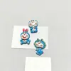 Acessórios de Pingente de Resina Doraemon Fofo em Estoque Acessórios de Cabelo Capa de Celular Decorações para Copos Chaveiro Ímã de Geladeira