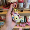 Llavero de Cámara de Proyección de Dibujos Animados Sanrio Colgante para Bolso Juguete para Niños Colgante Luminoso Pequeño Regalo Venta al por Mayor