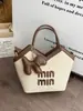 Bolso tote de gran capacidad para mujer 2026 nueva moda verano bolso de hombro tejido bolso de axila bolso casual para clase y para ir al trabajo
