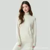 Al por mayor de fábrica, cuello alto, hombro raglán, manga larga, jersey de color liso, versátil y moderno, nuevo suéter de punto básico para otoño e invierno