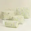 Bolsa de Maquillaje Acolchada Súper Nueva de Gran Capacidad Juego Floral de Cuatro Piezas Bolsa de Almacenamiento Neceser Interior de Algodón para Lápices Ins Viaje