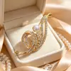Broche de perla con nota musical de lujo, chapado en oro, lleno de diamantes, pasador aerodinámico, accesorio para camisas, trajes y vestidos, disponible directamente del fabricante