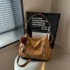 Bolsa tote grande estilo retrô coreano transfronteiriça, nova bolsa de ombro cruzado da moda para outono/inverno, bolsa casual de braço