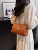 Bolso cruzado para mujer 2026 nuevo versátil para el trabajo bolsa cuadrada pequeña estilo coreano moderno diseño simple bolso de hombro bolso cruzado para mujer