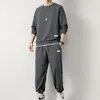 Traje de gofre para hombre, otoño nuevo, deportivo informal, pantalones de manga larga, traje de dos piezas, marca de moda, elegante traje de una sola pieza, ropa