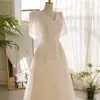 Vestido de Novia Ligero Estilo Coreano Otoño 2026 Nuevo Sencillo Nicho Moda Tendencia Fotografía de Viajes al Aire Libre Manga Corta Vestido de Compromiso