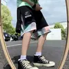 Shorts abotonados de calle para hombre, tendencia de verano ins, shorts casuales de talla grande, shorts de baloncesto holgados para usar al aire libre