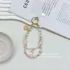 Cadena para Teléfono con Cuentas de Atmósfera de Primavera y Verano Cola de Pez Festoneada Moda Diseño de Nicho Colgante Versátil Exquisito Retro