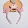 Faixa de Cabelo Fofa para Lavar o Rosto para Mulheres 2024 Nova Headwear de Desenho Animado Faixa de Cabelo Faixa de Cabelo Grampo de Cabelo de Pelúcia Presente Venda por Atacado