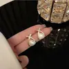 Aretes coreanos de nuevo estilo en forma de corazón cruzado, pequeños, simples y versátiles, al por mayor