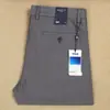 Calça Casual Masculina Nova de Sarja Fina Modal Elástico Reta Solta Absorvente de Suor Respirável para Primavera e Verão