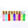 Botella de bola rodante de 10 ml, botella cilíndrica de bola rodante de color, botella de aceite esencial de 5 ml, botella vacía, tapa de madera, botella de bola rodante graduada.