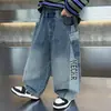 Jeans de Semicurva con Retazos para Niños de Primavera y Otoño Estilo Coreano Pantalones Casuales Versátiles Sueltos Atractivos para Niños Pantalones de Bebé