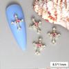Joyería para uñas de cruz con incrustaciones de diamantes Tendencia europea y americana Accesorios para uñas de aleación para usar decoración DIY venta al por mayor reflejo superficial