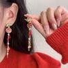 Pendientes de borlas rojas de la fortuna del Año Nuevo chino, pendientes largos con temperamento femenino, diseño de nicho, pendientes únicos y dulces de Año Nuevo.